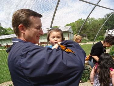 Rick and Emily with a monarch
